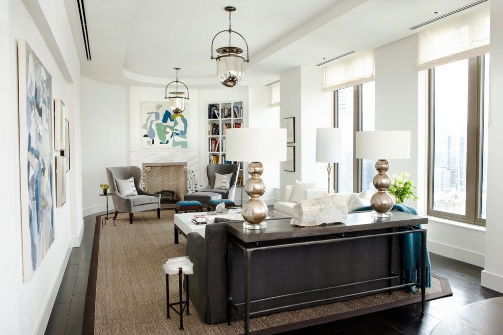 A suite sitting room with a sofa and armchairs